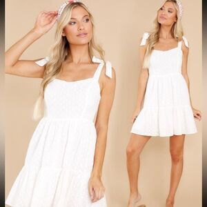 Lush size Medium white dress from Red Dress Boutique. NWT and never worn.